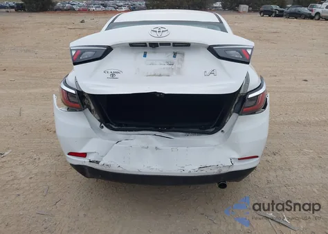 2018 Toyota Yaris Ia из США, поврежденный, VIN 3MYDLBYV5JY304177